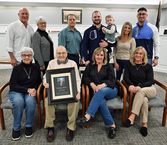 <p>George Miller, after serving as West Pittston tax collector for 26-years, has retired from service. Shown with him is his family, as his resignation was accepted at the council meeting on Wednesday night. Front row: Lois Miller, Jackie Miller Koscelansky, Barbi Miller Argenio. Back row: Jeff Koscelansky, Joyce Lloyd, Paul Argenio, Alex Argenio with son Max, Christie Argenio Pearson, Eddie Pearson.</p>
<p>Tony Callaio | For Sunday Dispatch</p>