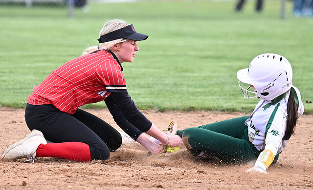 132289410_web1_WA-HR-Sftbl-2
Holy Redeemers shortstop Covington Lehman tags out Wyoming Areas Allison Layland trying to steal in the fourth inning.
Tony Callaio | For Times Leader