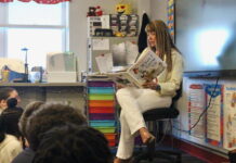 
			
				                                Lori Spencer, a real estate agent for ERA One Source Realty, reads to a class of students.
                                 Sydney Allabaugh | Sunday Dispatch

			
		