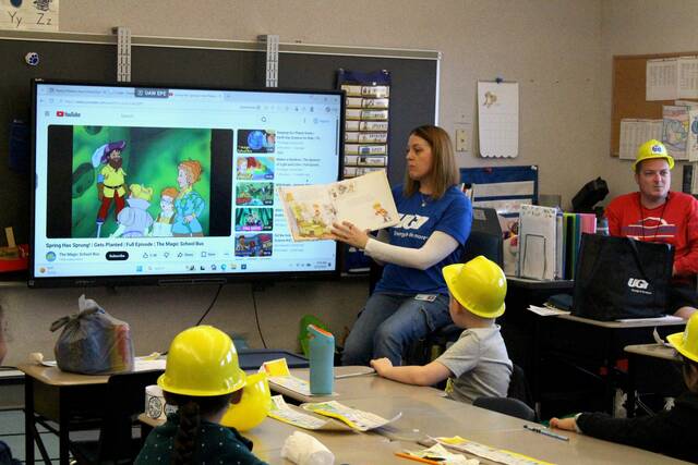 <p>Students, wearing plastic hard hats from UGI, listen to “When I Grow Up” by Al Yankovic.</p>
<p>Sydney Allabaugh | Sunday Dispatch</p>