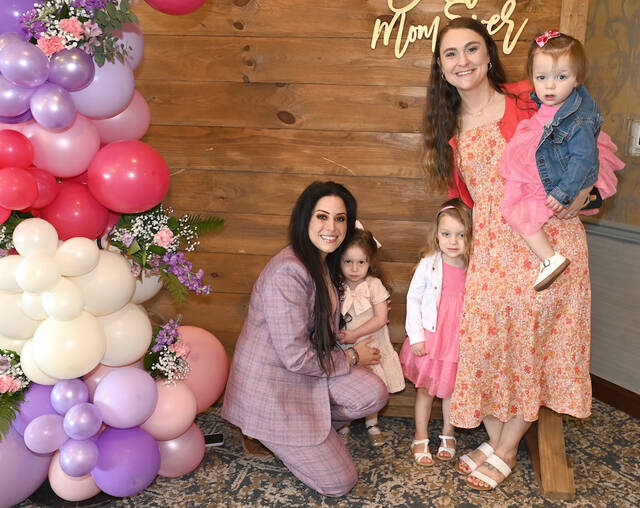 132337600_web1_Tiny-Learners-Mother-s-Day-1
Moms Angela Sperrazza (with daughter, Carmella Homza) and Liz Sperrazza (with daughters, Liliana and Olivia Sperrazza), pose in front of the wall of balloons at Fox Hill Country Club for the Mothers Day luncheon for Tiny Learners Learning Center.
Tony Callaio | For Sunday Dispatch
