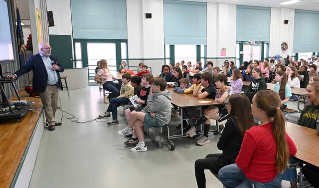 132351233_web1_WA-Author-Parmelee-1
Local author David Parmelee, left, read from his book of poetry to elementary students of Wyoming Area Intermediate Center on May 15.
Tony Callaio | For Sunday Dispatch