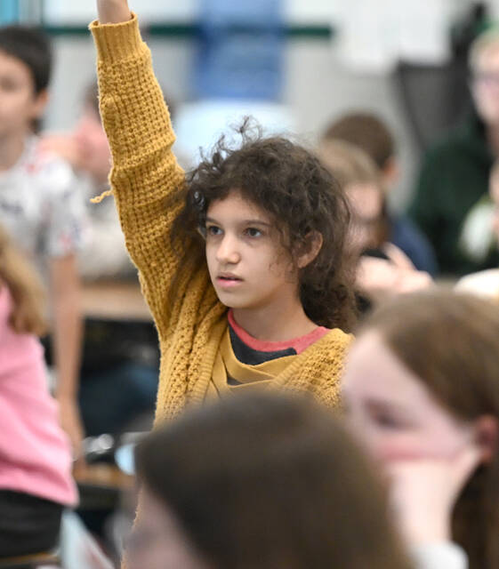 <p>Wyoming Area Intermediate Center student Regina Cretan participated in the assembly with author David Parmelee.</p>
<p>Tony Callaio | For Sunday Dispatch</p>