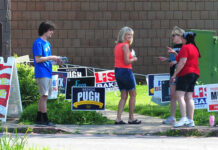 
			
				                                A voter stops to chat with poll workers Tuesday at the Kingston Recreation Center.
                                 Mark Moran | For Times Leader

			
		