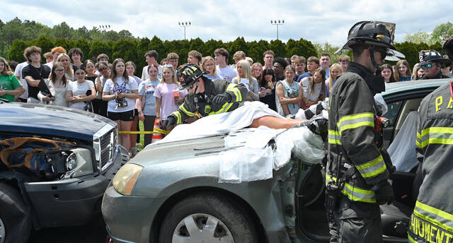 <p>A first responder covers the mock car ‘fatality’ at Pittston Area on Wednesday.</p>
<p>Tony Callaio | For Sunday Dispatch</p>