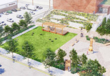 
			
				                                This aerial-view rendering looking east shows the proposed greenspace located behind the Market & Main seven-story building, including the new American Theatre.
                                 Submitted Artwork

			
		