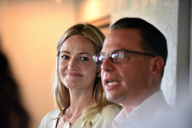 <p>Scranton Mayor Paige Cognetti listens as Gov. Josh Shapiro speaks to the media in support of her campaign for Congress on Wednesday at The Avenue Restaurant and Catering in Wyoming.</p>
<p>Liz Baumeister | Sunday Dispatch</p>