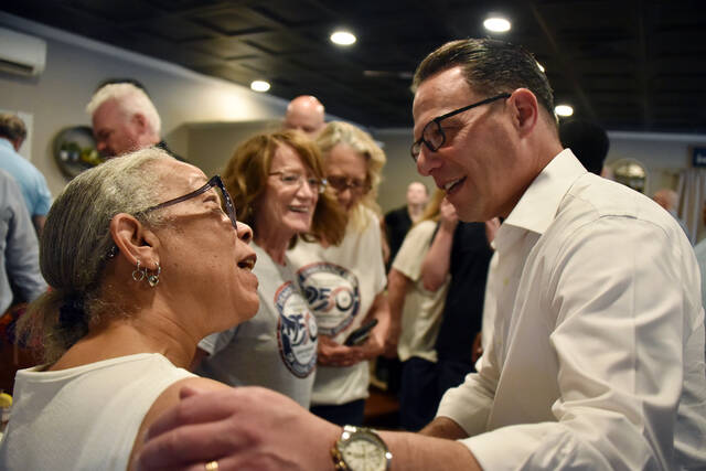 <p>Gov. Josh Shapiro greets local artist Michele Trimingham of Wilkes-Barre during Wednesday’s event at The Avenue Restaurant and Catering in Wyoming.</p>
<p>Liz Baumeister | Sunday Dispatch</p>