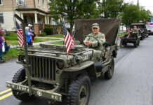 
			
				                                Military vehicle restorer Carmen Falcone entered his jeep in the Memorial Day Parade.
                                 Tony Callaio | For Sunday Dispatch

			
		