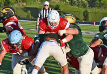 
			
				                                UNICO Pioneers Brody Spindler, center red shirt, of Pittston Area, picks up where he left off last fall by bulldozing his way to a one-yard touchdown for the first score of the night of the 75th UNICO All-Star game at Wilkes-Barre Areas home field on Thursday evening.
                                 Tony Callaio | For Times Leader

			
		