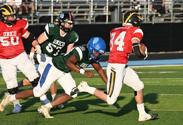 <p>Jayden Skipalis (34) of Lake Lehman finds daylight on an end-around for the UNICO Pioneers on Thursday night.</p>
<p>Tony Callaio | For Times Leader</p>