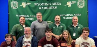 
			
				                                State track and field medalist Ben Gravine from Wyoming Area is committed to continuing his career in the sport while attending Susquehanna University. From left, first row: Noah Gravine, brother; Richard Gravine, father; Ben Gravine; Sara Gravine, mother; and Jack Gravine. Second row: Mike Fanti, Wyoming Area throwing coach; Dr. Jon Pollard, superintendent; Joe Pizano, head track coach and athletic director; and Randy Spencer, Gravines head football coach.
                                 Submitted Photo

			
		
