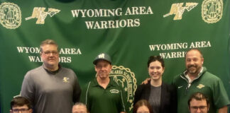 
			
				                                Wyoming Areas Gianna Chapman recently committed to continue her academic and athletic careers at Lackawanna College as a wrestler. From left, first row: Alexzander Chapman, brother; Keri Chapman, mother; Giavonna Chapman; Mark Chapman, father. Second row: Wyoming Area Superintendent Jon Pollard, Coach Steve Mytych, Coach Gia Larson, and Athletic Director Joe Pizano.
                                 Submitted Photo

			
		