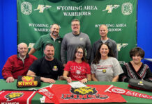 Wyoming Area’s Sarah Mizenko commits to King’s College
Wyoming Areas Sarah Mizenko has committed to play soccer and run track and field while studying at Kings College. From left, first row: Tom Taylor, grandfather; Stephen Mizenko, father; Sarah Mizenko; Lori Mizenko, mother; and Ann Marie Taylor, grandmother. Second row: Joe Pizano, Wyoming Area track coach and athletic director; Jon Pollard, superintendent; and Chad Kranson, soccer coach.
Submitted Photo