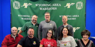 
			
				                                Wyoming Areas Sarah Mizenko has committed to play soccer and run track and field while studying at Kings College. From left, first row: Tom Taylor, grandfather; Stephen Mizenko, father; Sarah Mizenko; Lori Mizenko, mother; and Ann Marie Taylor, grandmother. Second row: Joe Pizano, Wyoming Area track coach and athletic director; Jon Pollard, superintendent; and Chad Kranson, soccer coach.
                                 Submitted Photo

			
		