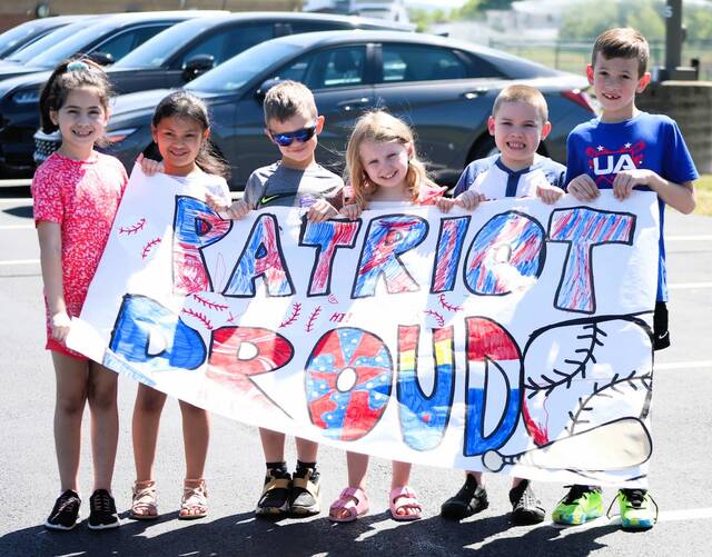 132404905_web1_PA-baseball-sendoff-1
Pittston Area primary students hold a handmade sign in support of the varsity baseball team.
Submitted Photo