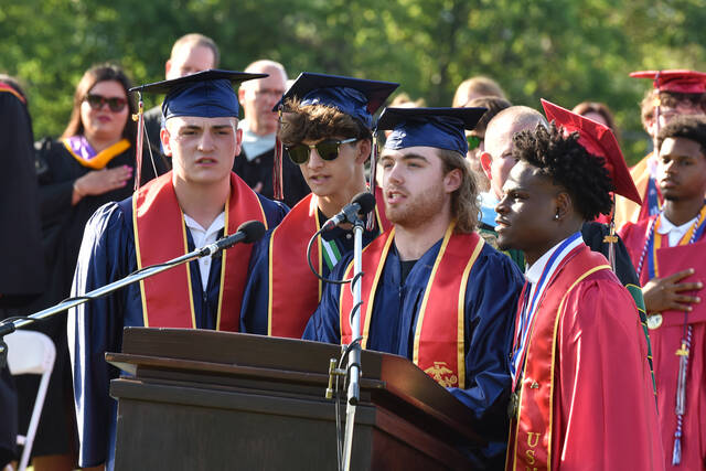 <p>Jakob Bolchune, Jaheim Butler, Giavonna Edwards, and Nicholas Logan, all of whom are entering the U.S. military, lead the Pledge of Allegiance during Pittston Area High School’s 60th Annual Commencement on Friday, June 5.</p>
<p>Liz Baumeister | Sunday Dispatch</p>
