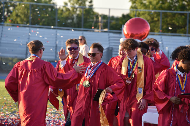 <p>Graduates celebrate following their cap toss on Friday, June 5, at Pittston Area High School. </p>
<p>Liz Baumeister | Sunday Dispatch</p>