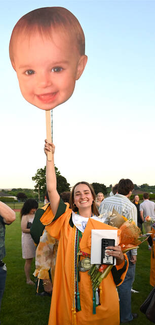 <p>It wasn’t hard for Wyoming Area Class of 2026 graduate Sarah Mizenko to find her family in the bleachers during graduation. Her family made up the giant headshot of Sarah as a baby. </p>
<p>Tony Callaio | For Times Leader</p>