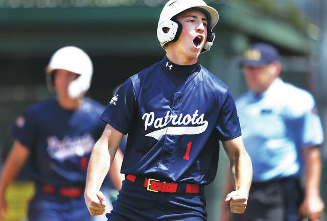<p>Pittston Area’s Nick Innamorati reacts to scoring on a triple by Beau Widdick in the second inning.</p>
<p>Fred Adams | For Sunday Dispatch</p>