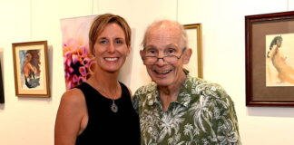 
			
				                                Artists Mary Kroptavich and Robert Bergie Bergstrasser stand in front of their joint exhibit at Art e Fekts Gallery in Pittston on Friday evening.
                                 Tony Callaio | For Sunday Dispatch

			
		