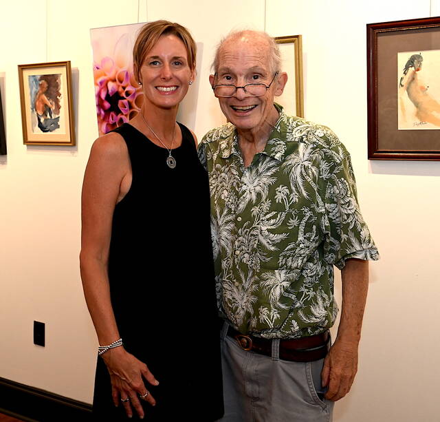 132422380_web1_Art-e-Fekts-Kroptavich-Bergstrasser-1
Artists Mary Kroptavich and Robert Bergie Bergstrasser stand in front of their joint exhibit at Art e Fekts Gallery in Pittston on Friday evening.
Tony Callaio | For Sunday Dispatch