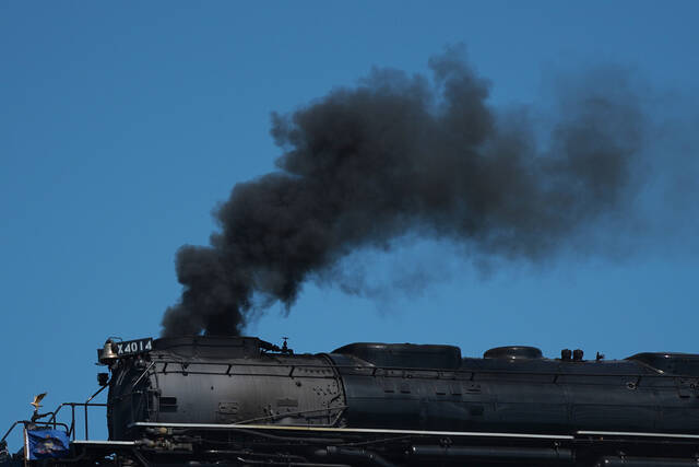 <p>Exhaust rises from the steam locomotive Union Pacific’s Big Boy No. 4014, in Nicholson on Saturday.</p>
<p>AP Photo</p>