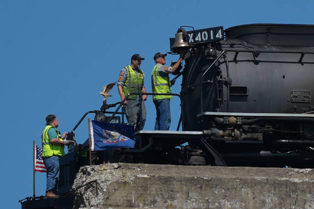 <p>Crew members of the steam locomotive Union Pacific’s Big Boy No. 4014 are seen as it pauses on the Tunkhannock Creek Viaduct in Nicholson on Saturday.</p>
<p>AP Photo</p>
