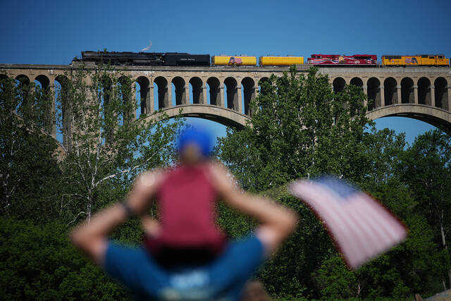 <p>People gather to see the steam locomotive Union Pacific’s Big Boy No. 4014, on the Tunkhannock Creek Viaduct in Nicholson on Saturday, as part of a coast-to-coast tour to celebrate America’s 250th anniversary.</p>
<p>AP Photo</p>