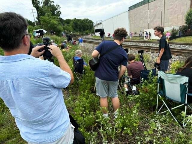 <p>Train enthusiasts set up their cameras, waiting for the Big Boy No. 4014 to come around the bend.</p>
<p>Margaret Roarty | Times Leader</p>