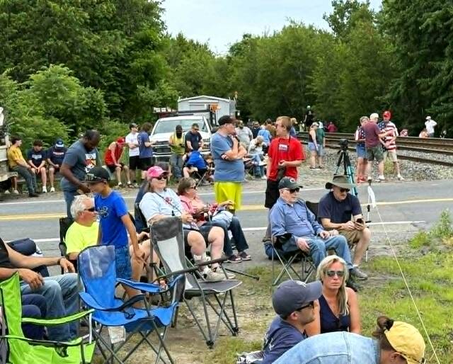 <p>Onlookers sit in folding chairs near the train tracks on Oak tracks, waiting to catch a glimpse of Big Boy No. 4014.</p>
<p>Margaret Roarty | Times Leader</p>