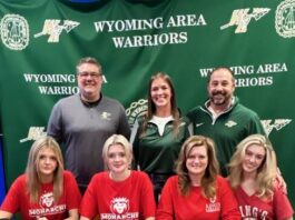 
			
				                                Wyoming Areas Sara Pealer committed to continue her academic and athletic careers as a volleyball player at Kings College. From left, first row: Gwyn Pealer, Sara Pealer, Melissa Pealer, and Lydia Pealer. Second row: Jon Pollard, Wyoming Area superintendent; Sara Mazzitelli, head coach; and Joe Pizano, athletic director.
                                 Submitted Photo

			
		