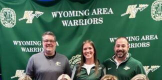 
			
				                                Wyoming Areas Sara Pealer committed to continue her academic and athletic careers as a volleyball player at Kings College. From left, first row: Gwyn Pealer, Sara Pealer, Melissa Pealer, and Lydia Pealer. Second row: Jon Pollard, Wyoming Area superintendent; Sara Mazzitelli, head coach; and Joe Pizano, athletic director.
                                 Submitted Photo

			
		