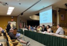 
			
				                                Tom Melone, whose firm is the districts business manager, gives a final budget presentation.
                                 Sydney Allabaugh | Times Leader

			
		