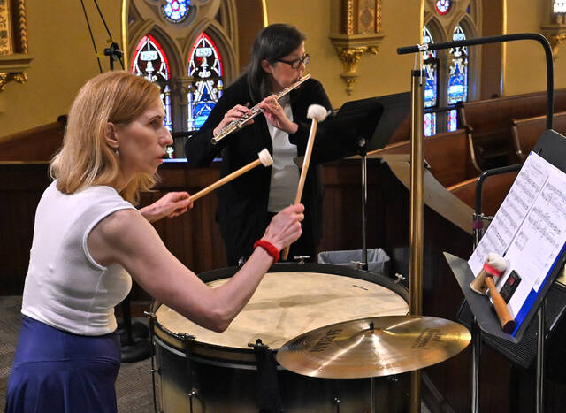 <p>Percussionist Monica Spishock, left, and flutist Cindy Fisher Thomas perform at the church choir loft for the Independence Day Concert at St. John the Evangelist Church, Pittston.</p>
<p>Tony Callaio | For Sunday Dispatch</p>