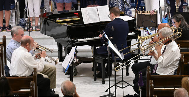 <p>The brass quartet consisted of Dale Chase, Dan Coyle, Chuck Smith, and Geoff Speicher, with Michael Sowa at the piano, at the annual Independence Day Concert.</p>
<p>Tony Callaio | For Sunday Dispatch</p>