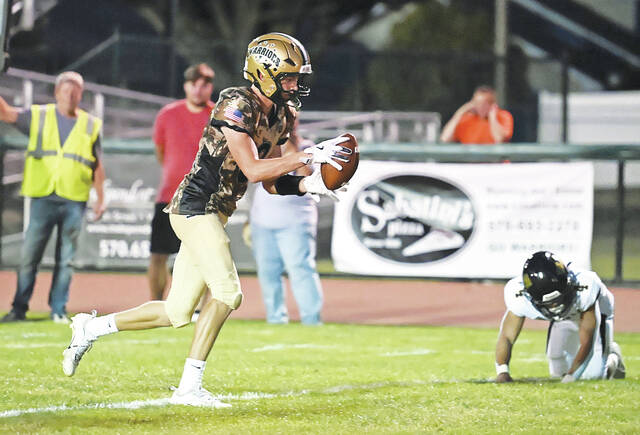 <p>Warrior Luke Kopetchny walks in for a touchdown run after Western Wayne defender RJ. Walton slipped on the turf on Sept. 5, 2025.</p>
<p>Tony Callaio file photo | For Times Leader</p>