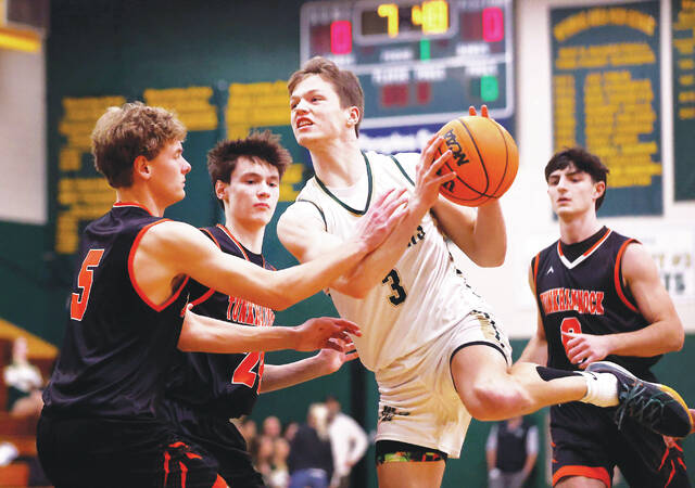132472605_web1_yo_t1_faa
Wyoming Area forward Luke Kopetchny drives close to the basket as Tunkhannocks Bode Lukasavage defends in the first quarter on Feb. 17.
Fred Adams file photo | For Times Leader