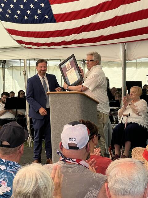 <p>Keynote speaker Christopher Pearl is presented with a plaque by Wyoming Commemorative Association President Frank Conyngham following his address about the battle and massacre of Wyoming.</p>
<p>Marcella Kester | For Sunday Dispatch</p>